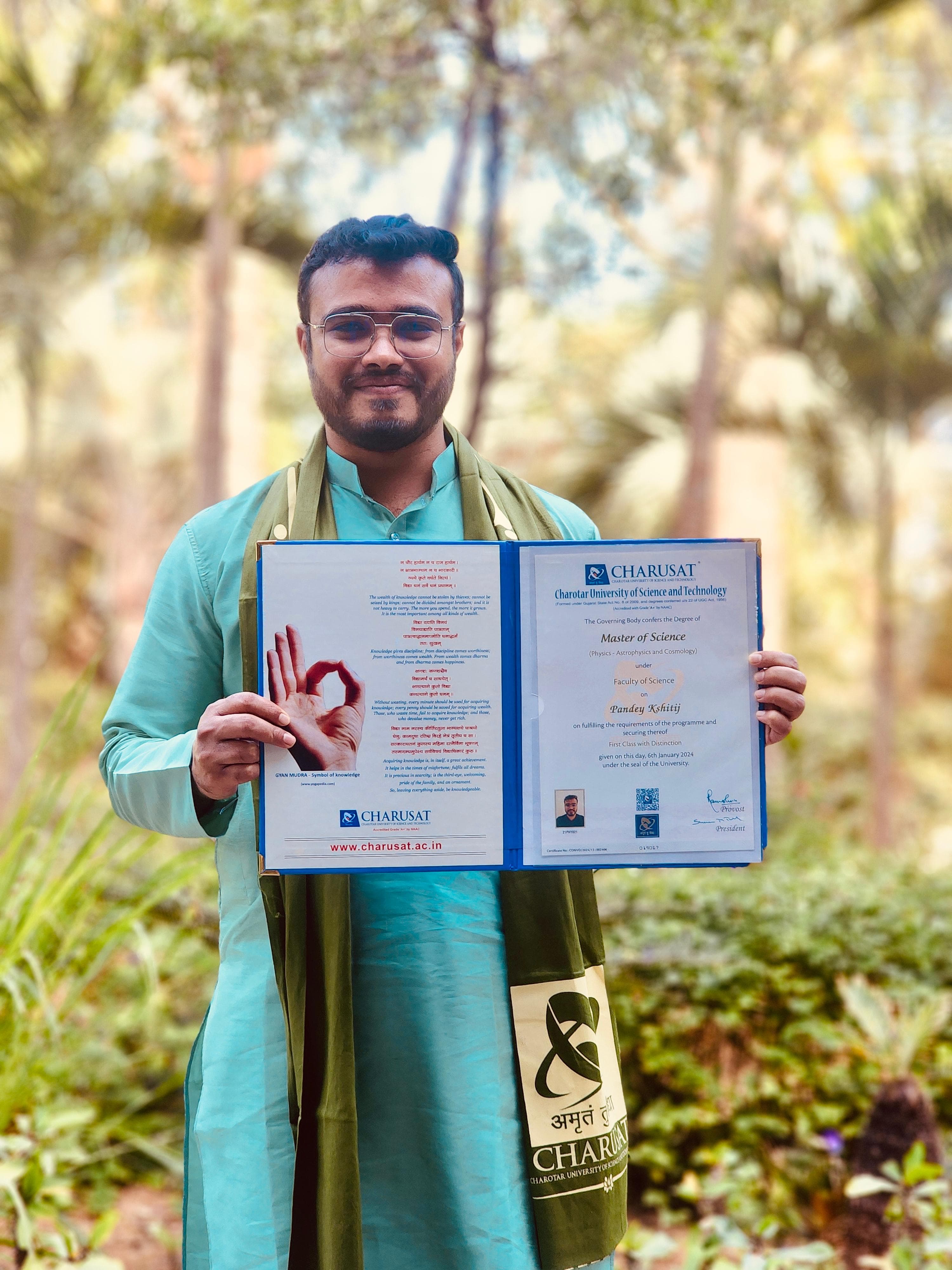 Kshitij with his M.Sc. Physics degree, Charusat University